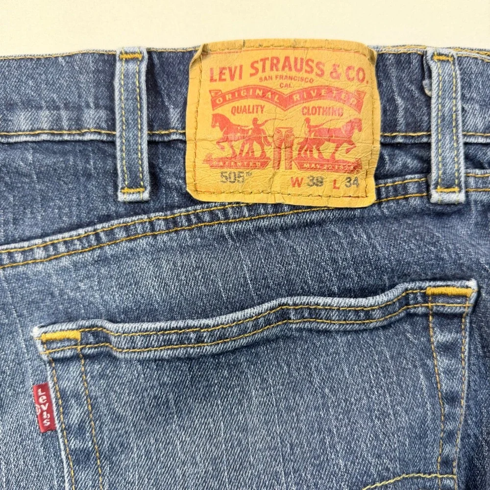 Levi's 505 Jeans Mens 38x34 Regular Fit Straight Leg Blue Denim Distressed Hem